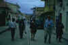 The group walking on a street on the island