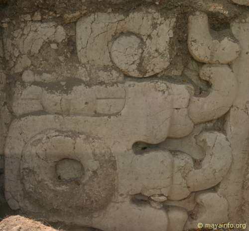 Jaguar paw on side of mask on left side of El Mirador Structure 34.